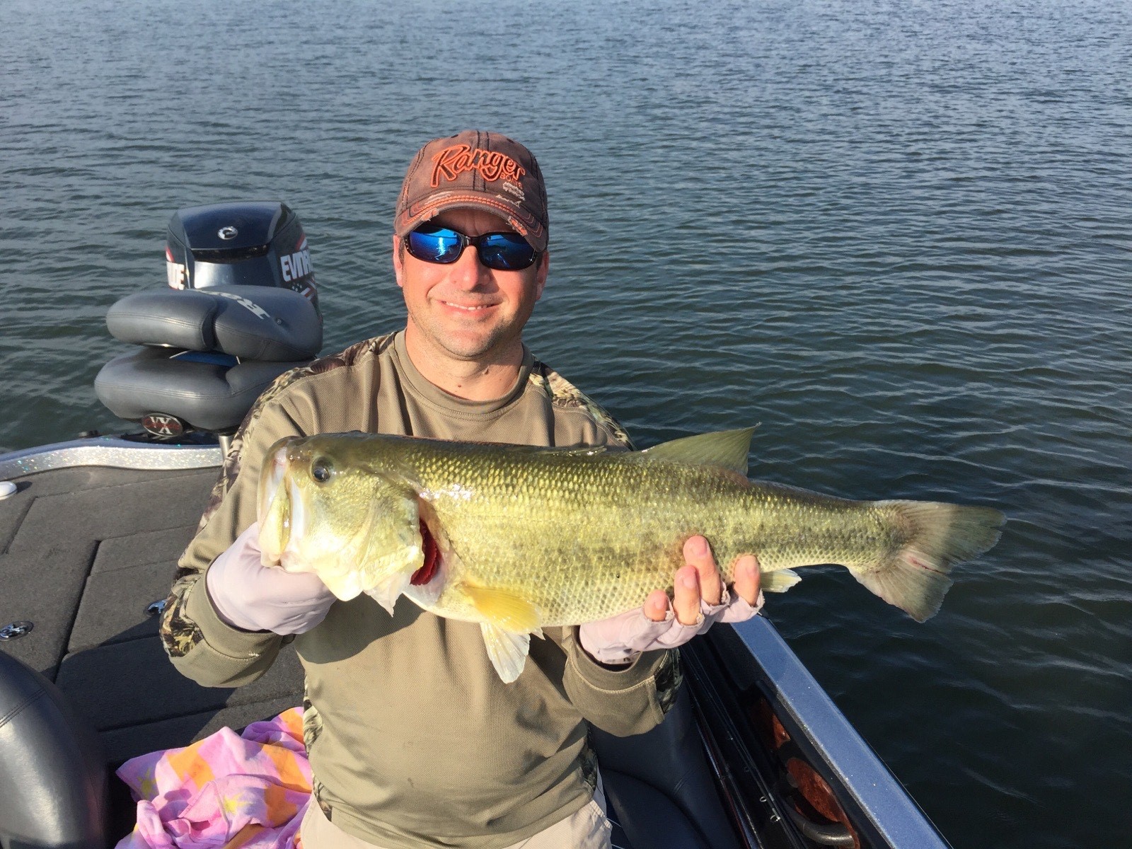 Ryan Oster holds a nice largemouth bass caught from Kentucky Lake