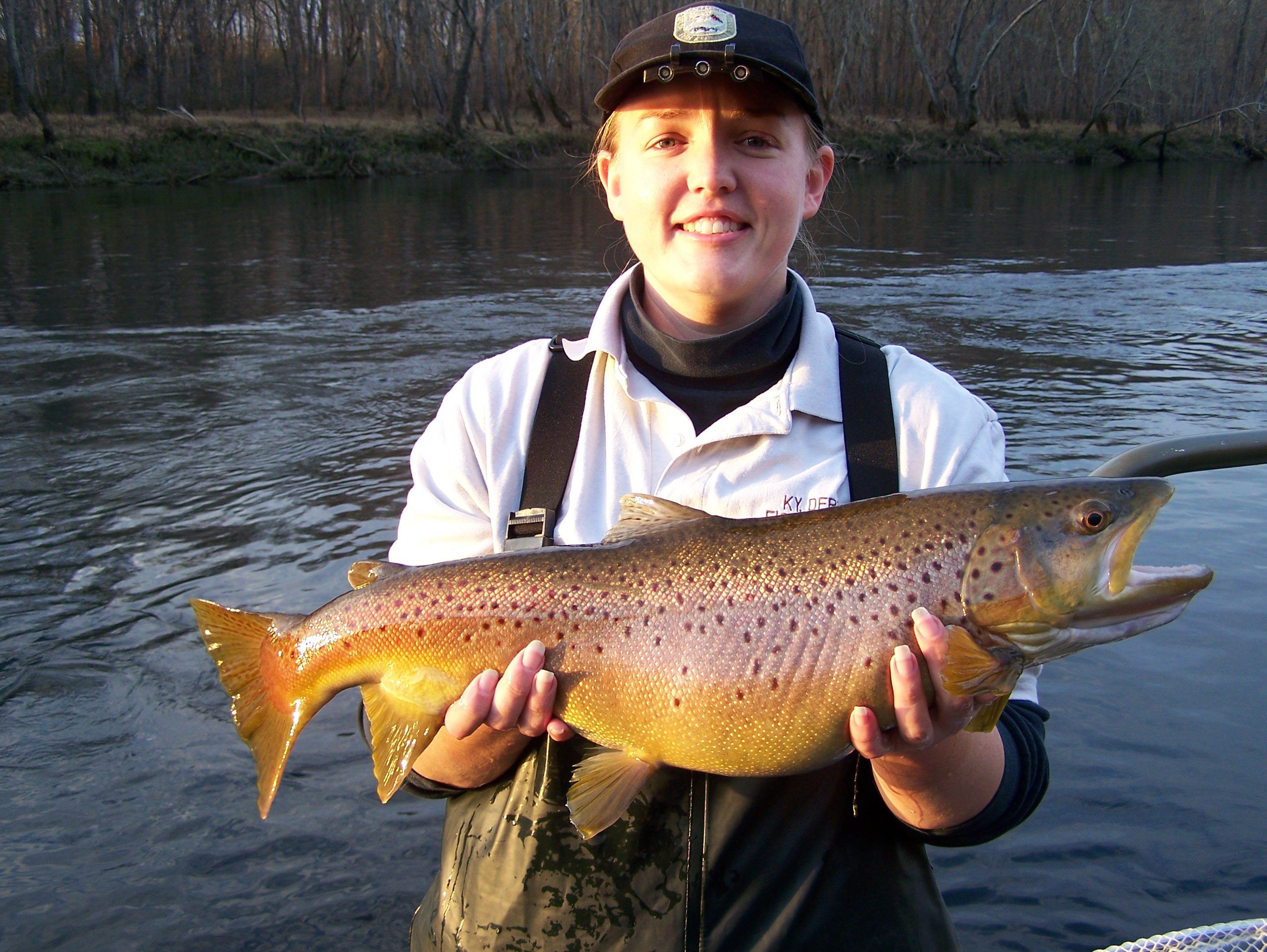 Marcy Anderson, Southeastern Fisheries District biologist for Kentucky Fish and Wildlife, holds an impressive brown trout